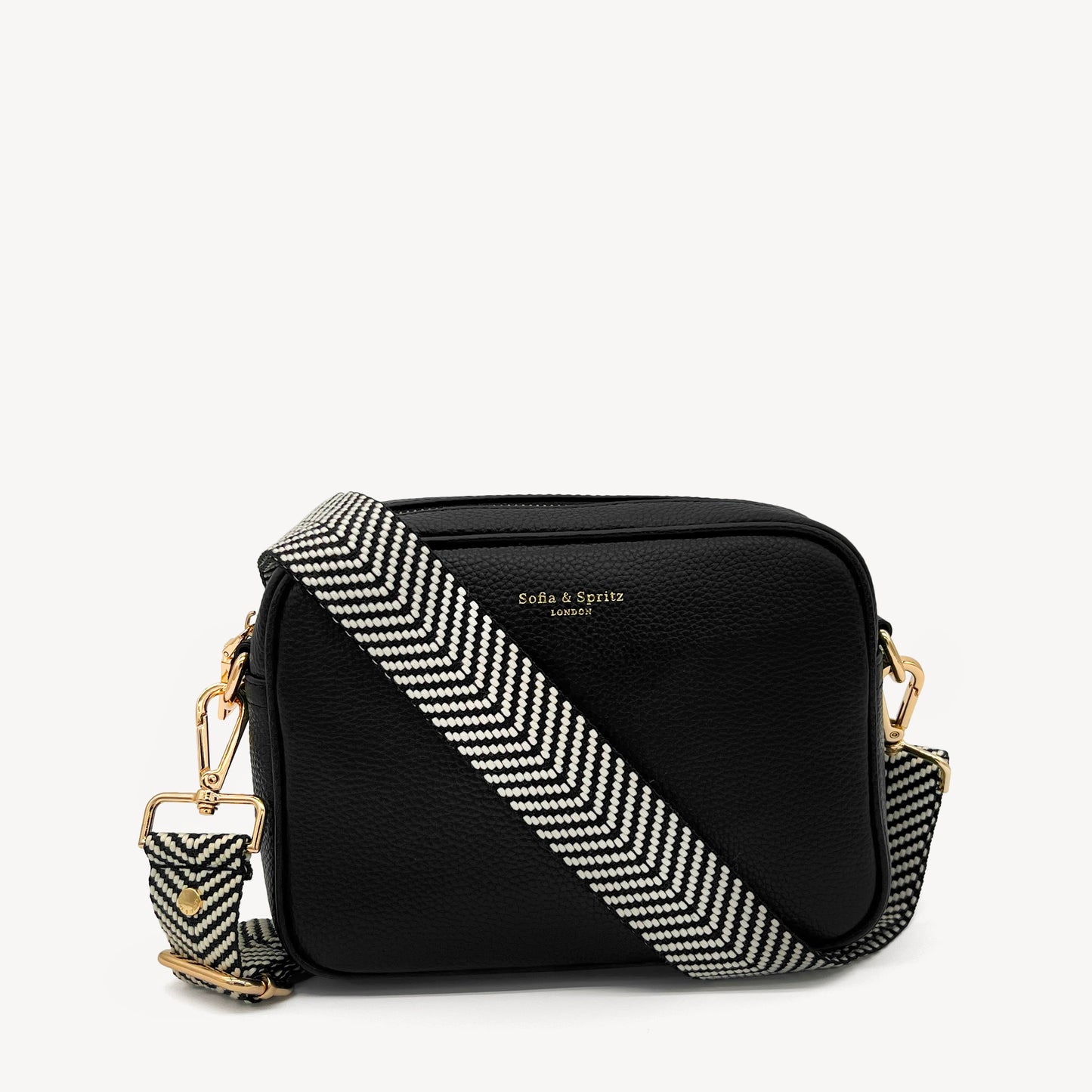 Correa elegante en negro y blanco con diseño chevron