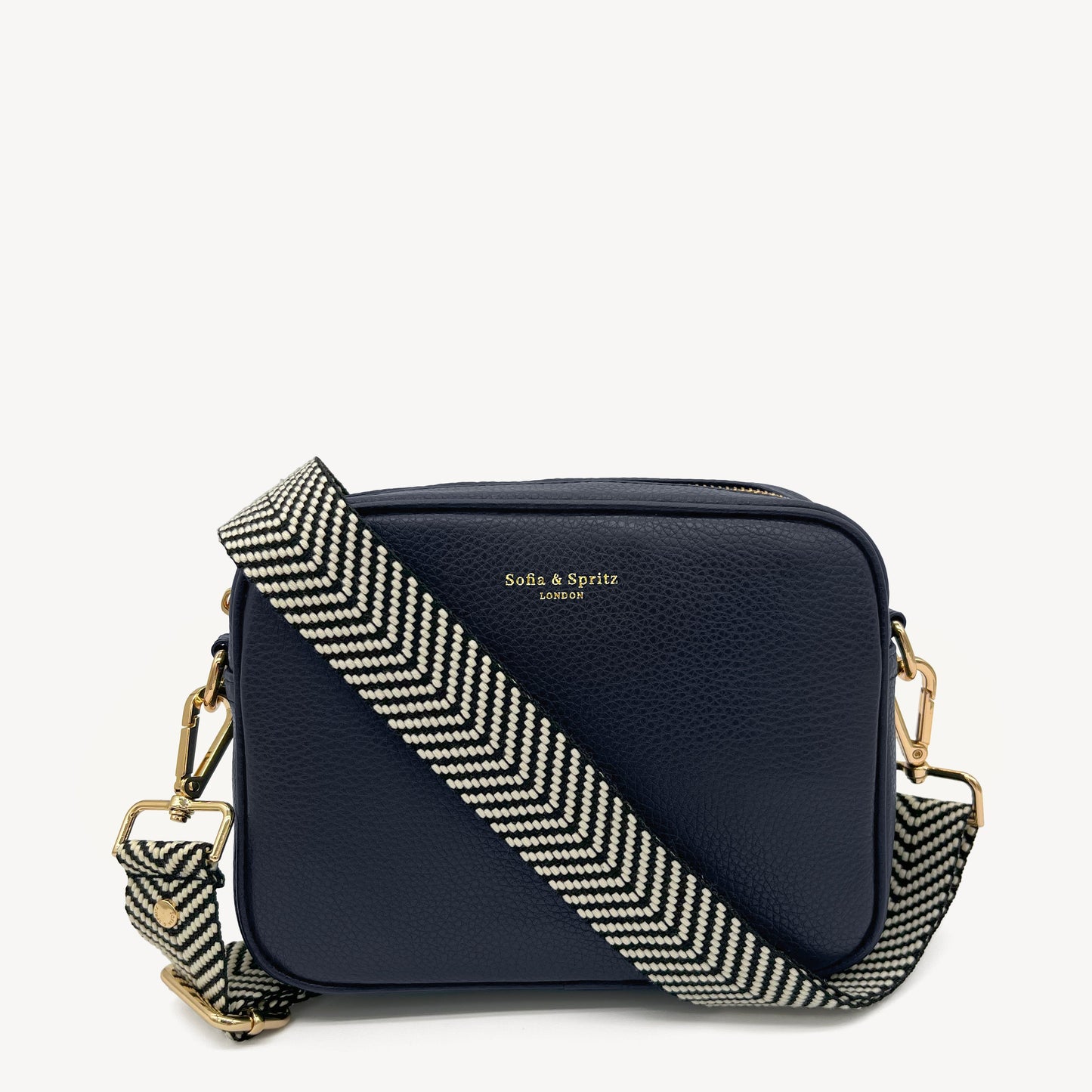 Correa elegante en negro y blanco con diseño chevron
