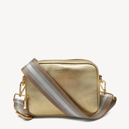 Correa a rayas champán y plata — accesorio lujoso y elegante