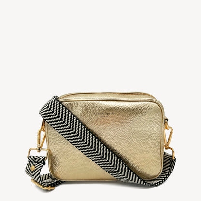 Correa elegante en negro y blanco con diseño chevron