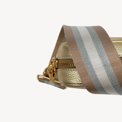 Correa a rayas champán y plata — accesorio lujoso y elegante