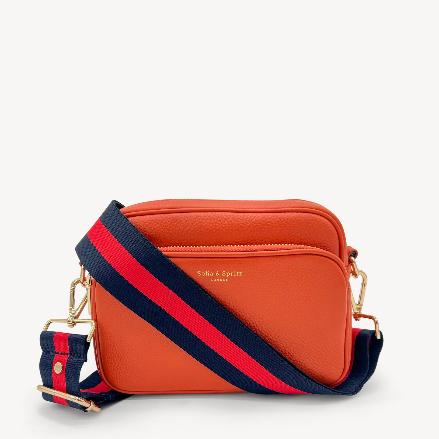 Correa de rayas azul marino y rojas — estilo audaz y clásico a rayas