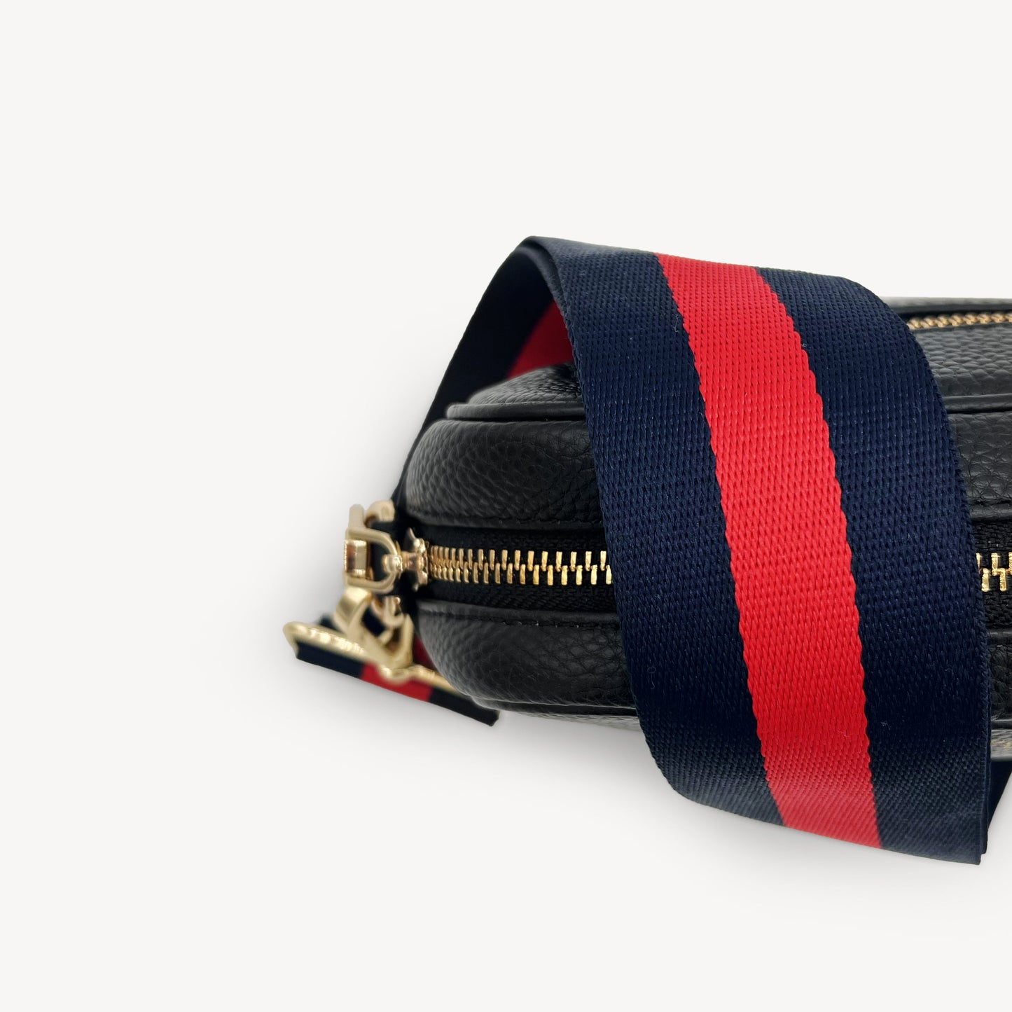 Correa de rayas azul marino y rojas — estilo audaz y clásico a rayas