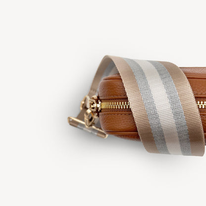 Correa a rayas champán y plata — accesorio lujoso y elegante