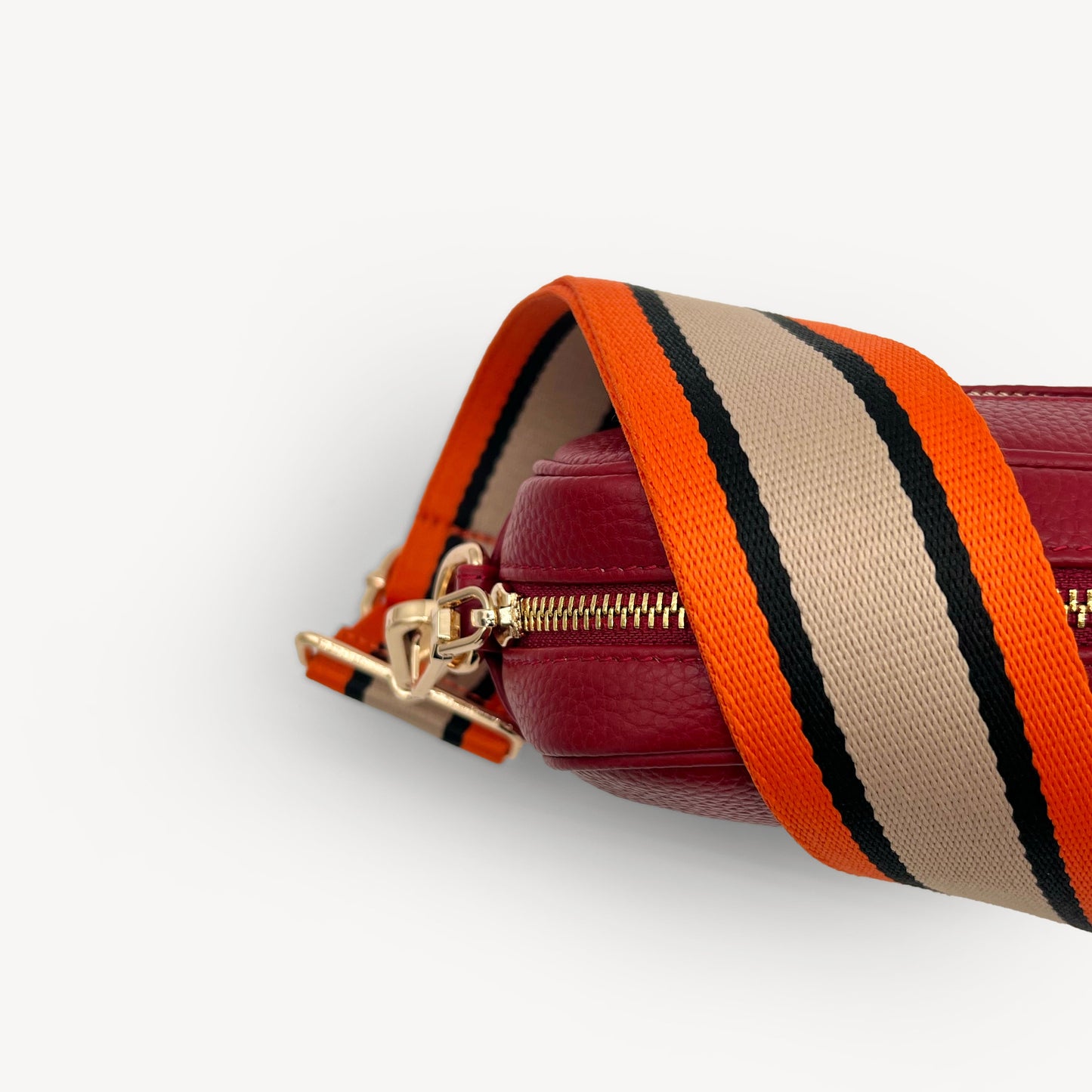 Correa a rayas naranja, beige y negro