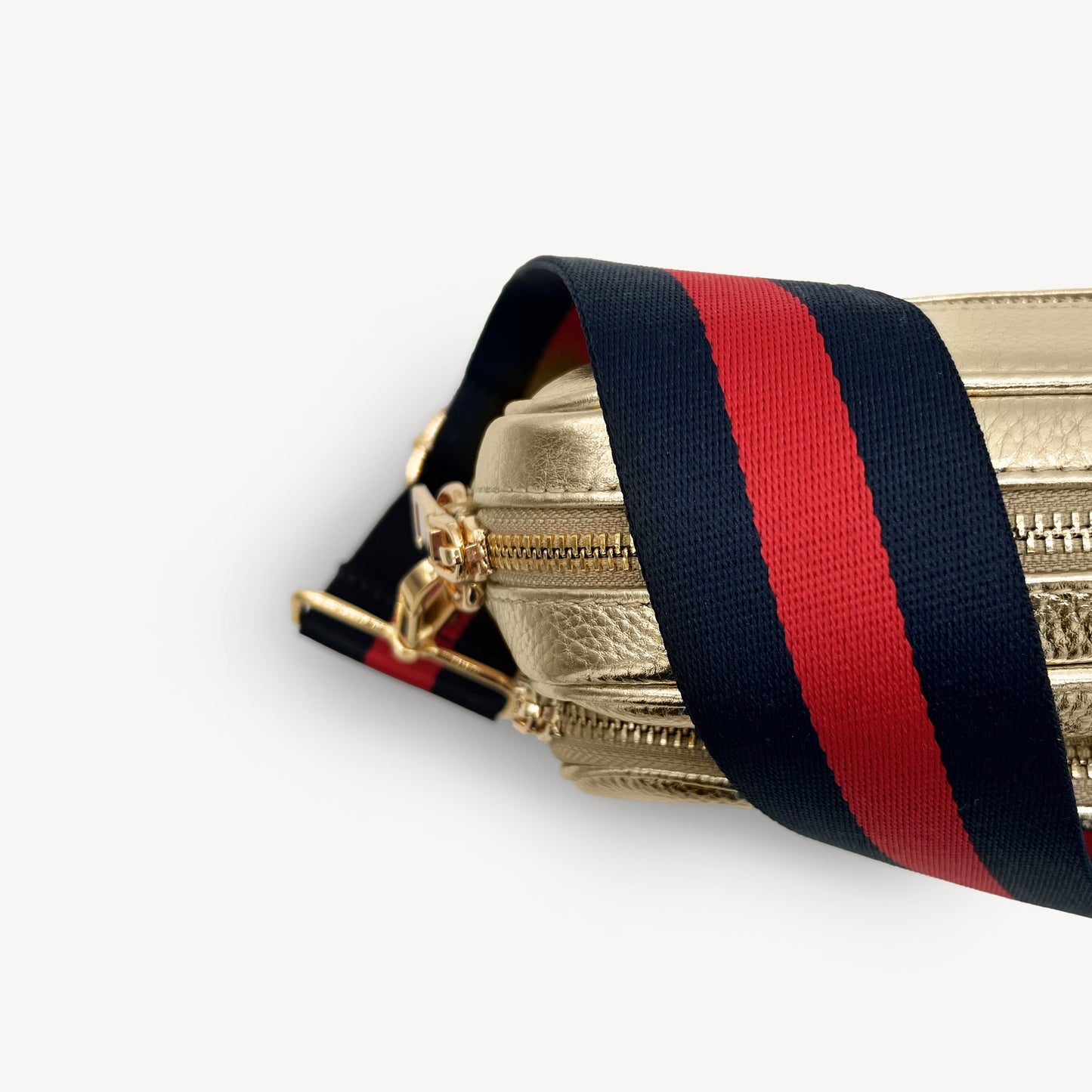 Correa de rayas azul marino y rojas — estilo audaz y clásico a rayas