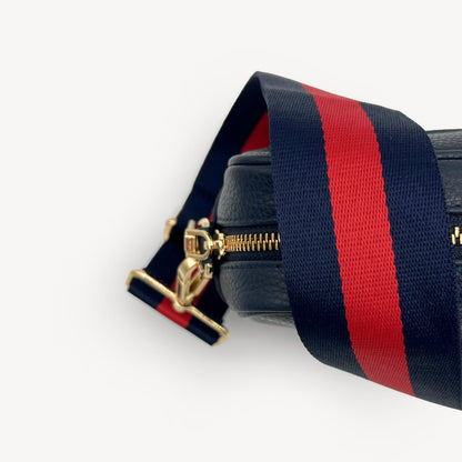 Correa de rayas azul marino y rojas — estilo audaz y clásico a rayas