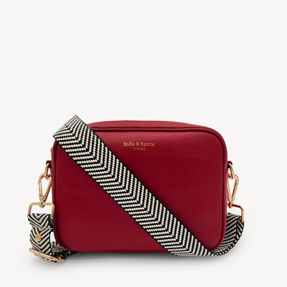 Correa elegante en negro y blanco con diseño chevron