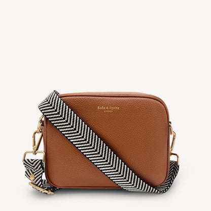Correa elegante en negro y blanco con diseño chevron