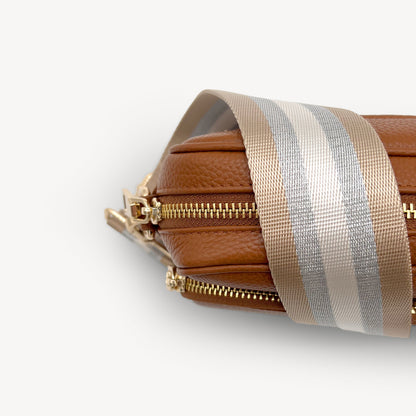 Correa a rayas champán y plata — accesorio lujoso y elegante