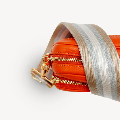 Correa a rayas champán y plata — accesorio lujoso y elegante
