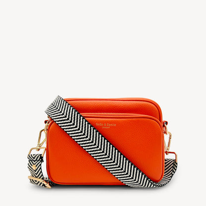 Correa elegante en negro y blanco con diseño chevron
