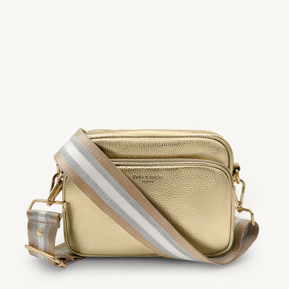 Correa a rayas champán y plata — accesorio lujoso y elegante