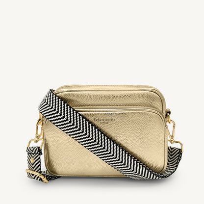 Correa elegante en negro y blanco con diseño chevron