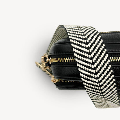 Correa elegante en negro y blanco con diseño chevron