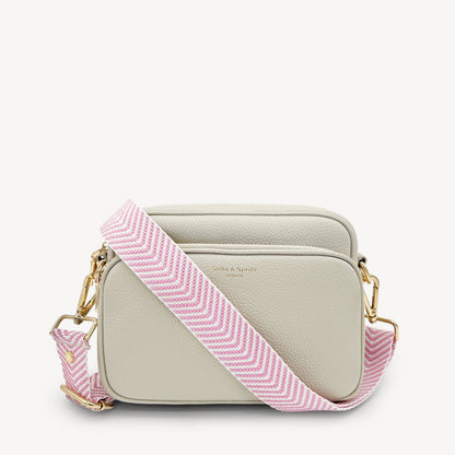 Correa elegante en rosa pálido y blanco con patrón chevron