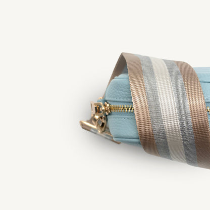Correa a rayas champán y plata — accesorio lujoso y elegante