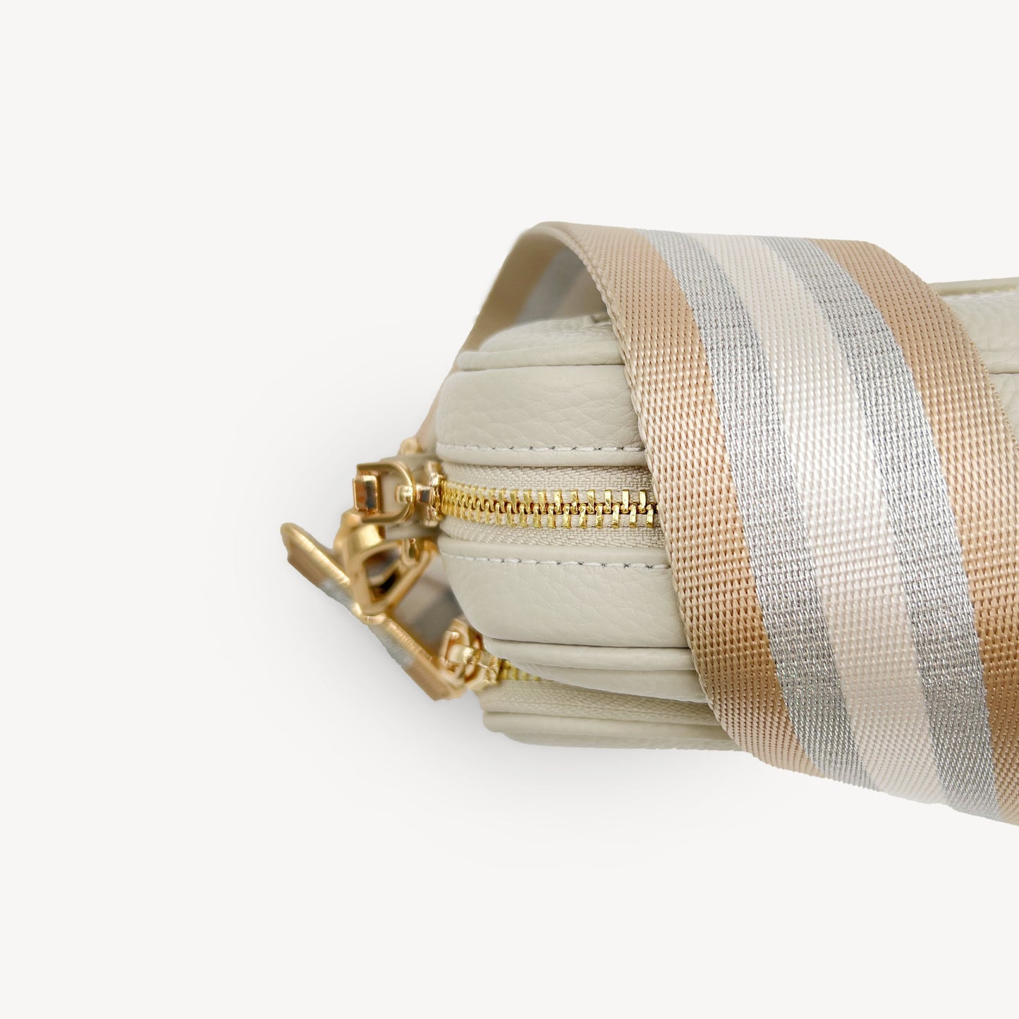 Correa a rayas champán y plata — accesorio lujoso y elegante