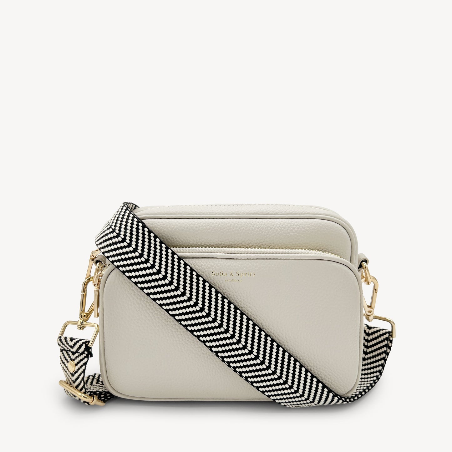 Correa elegante en negro y blanco con diseño chevron