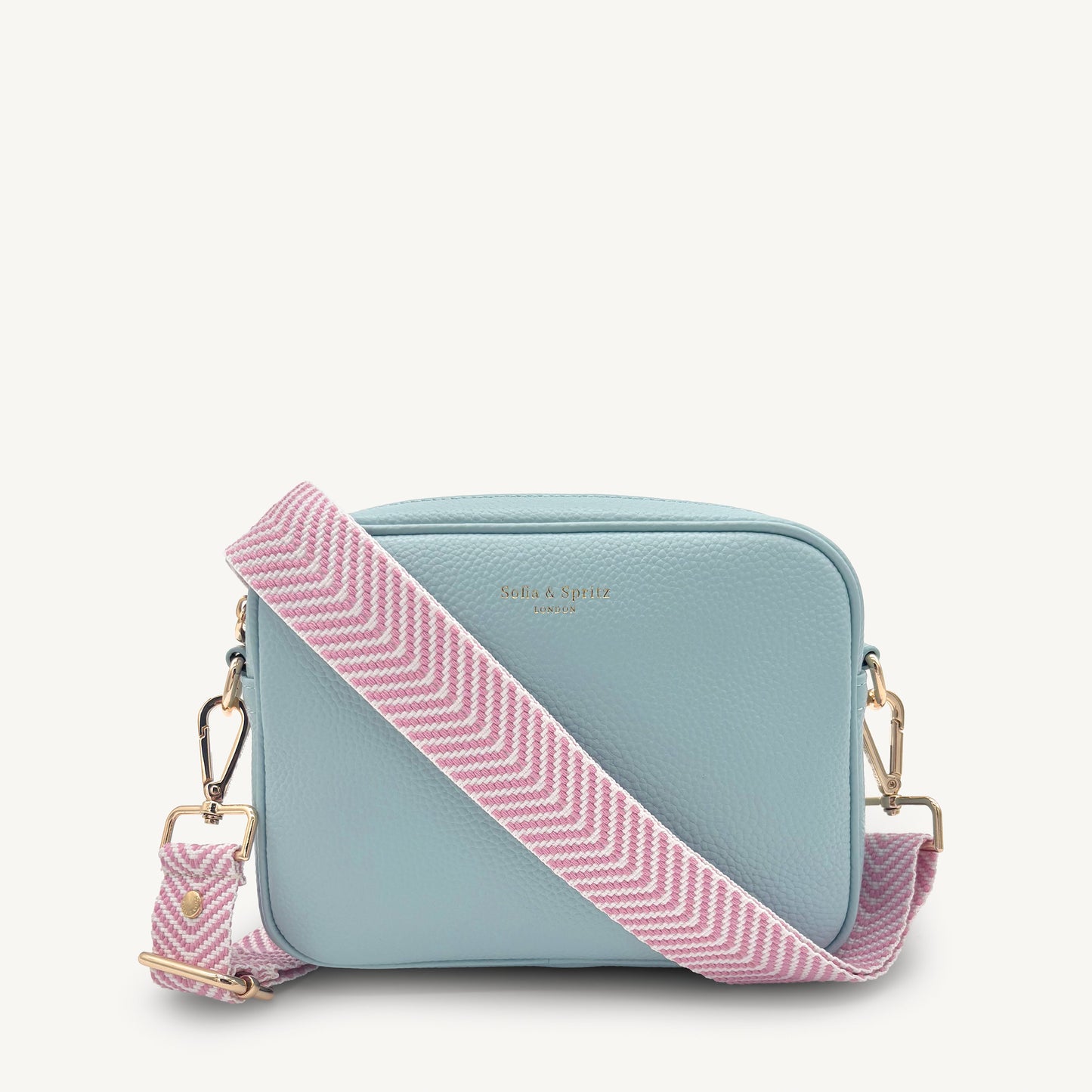 Correa elegante en rosa pálido y blanco con patrón chevron