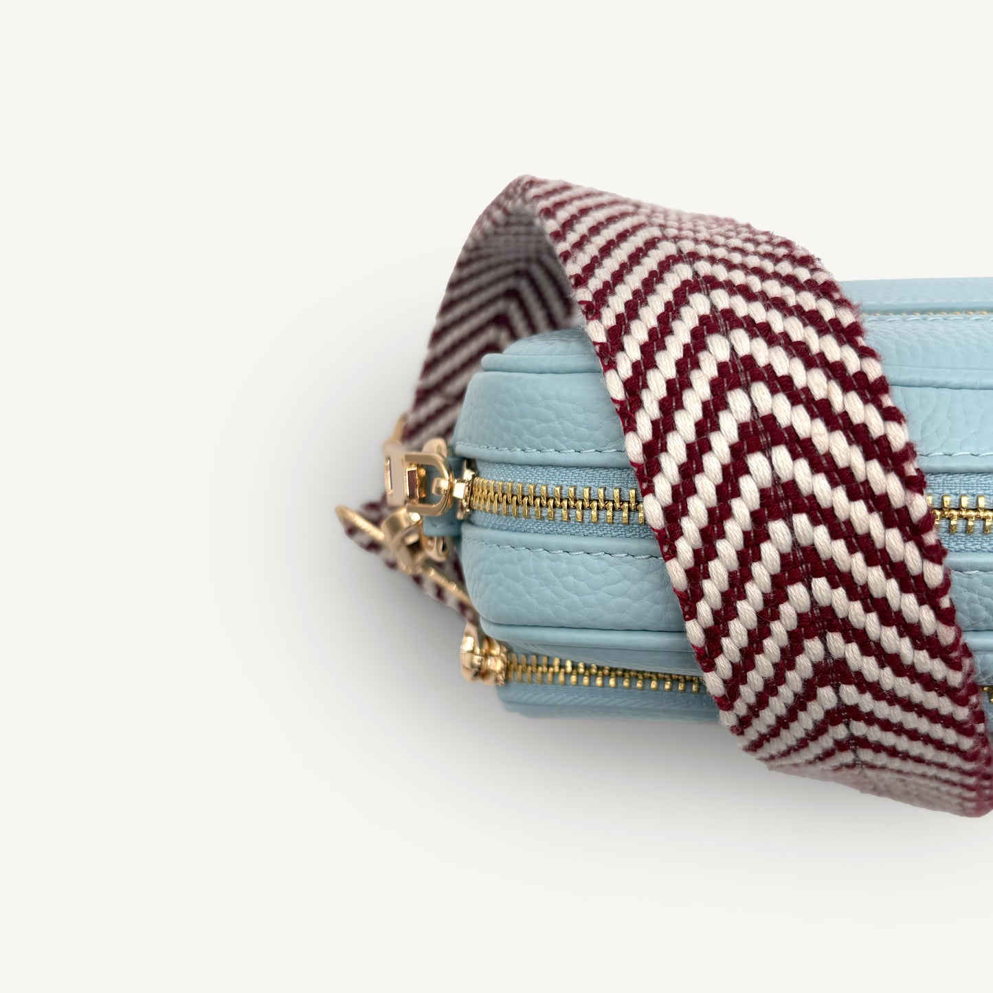 Correa de color burdeos y blanco con patrón en zigzag - Accesorio chic y moderno