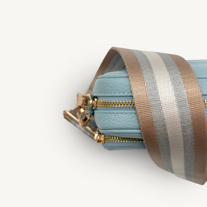 Correa a rayas champán y plata — accesorio lujoso y elegante