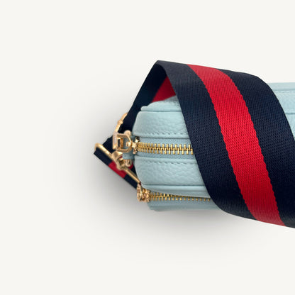 Correa de rayas azul marino y rojas — estilo audaz y clásico a rayas