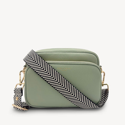 Correa elegante en negro y blanco con diseño chevron