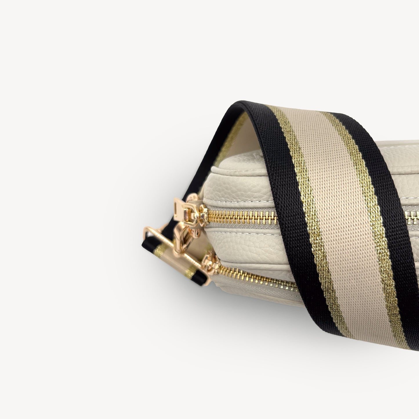 Correa elegante de rayas negras, beige y doradas
