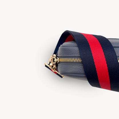 Correa de rayas azul marino y rojas — estilo audaz y clásico a rayas