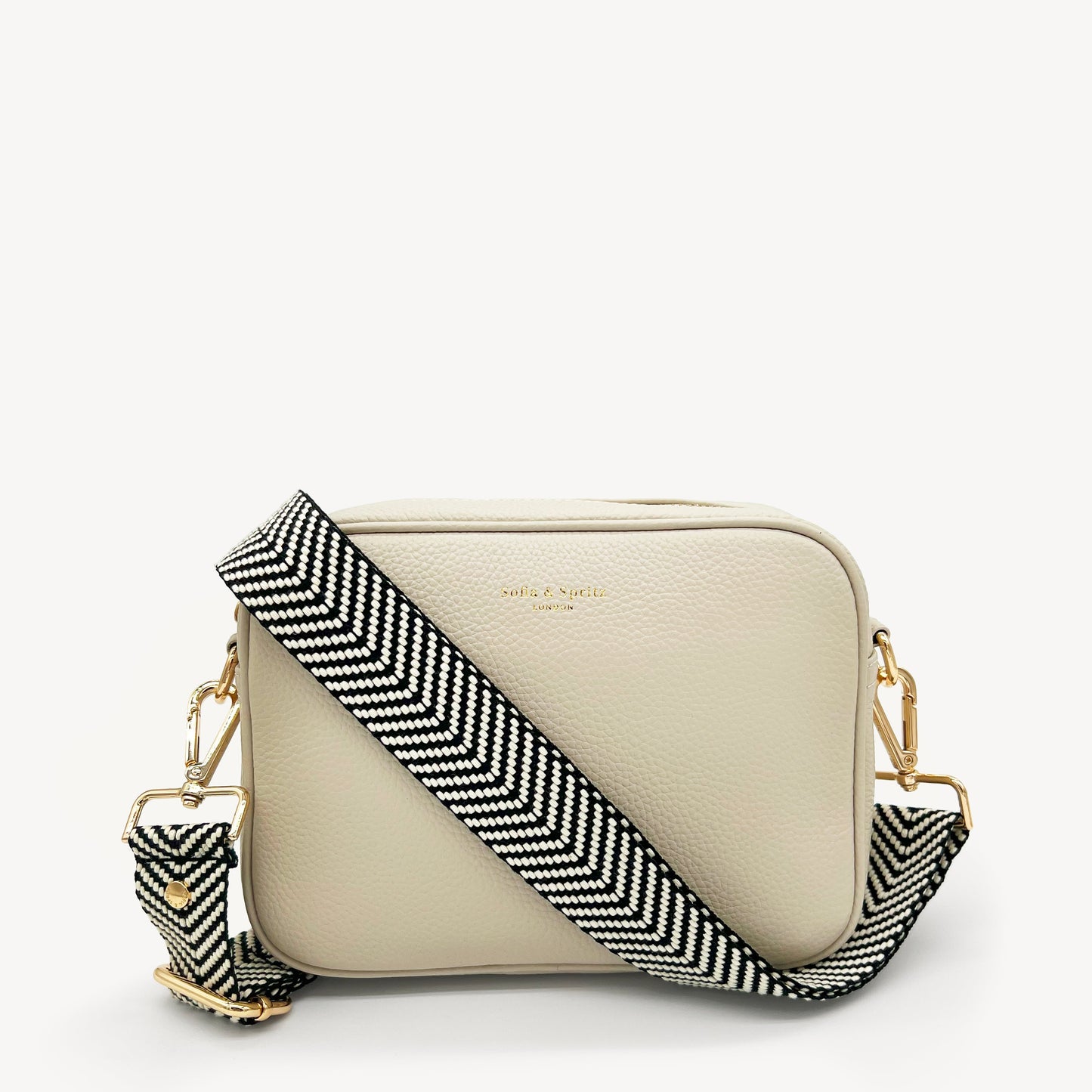 Correa elegante en negro y blanco con diseño chevron