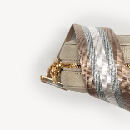 Correa a rayas champán y plata — accesorio lujoso y elegante