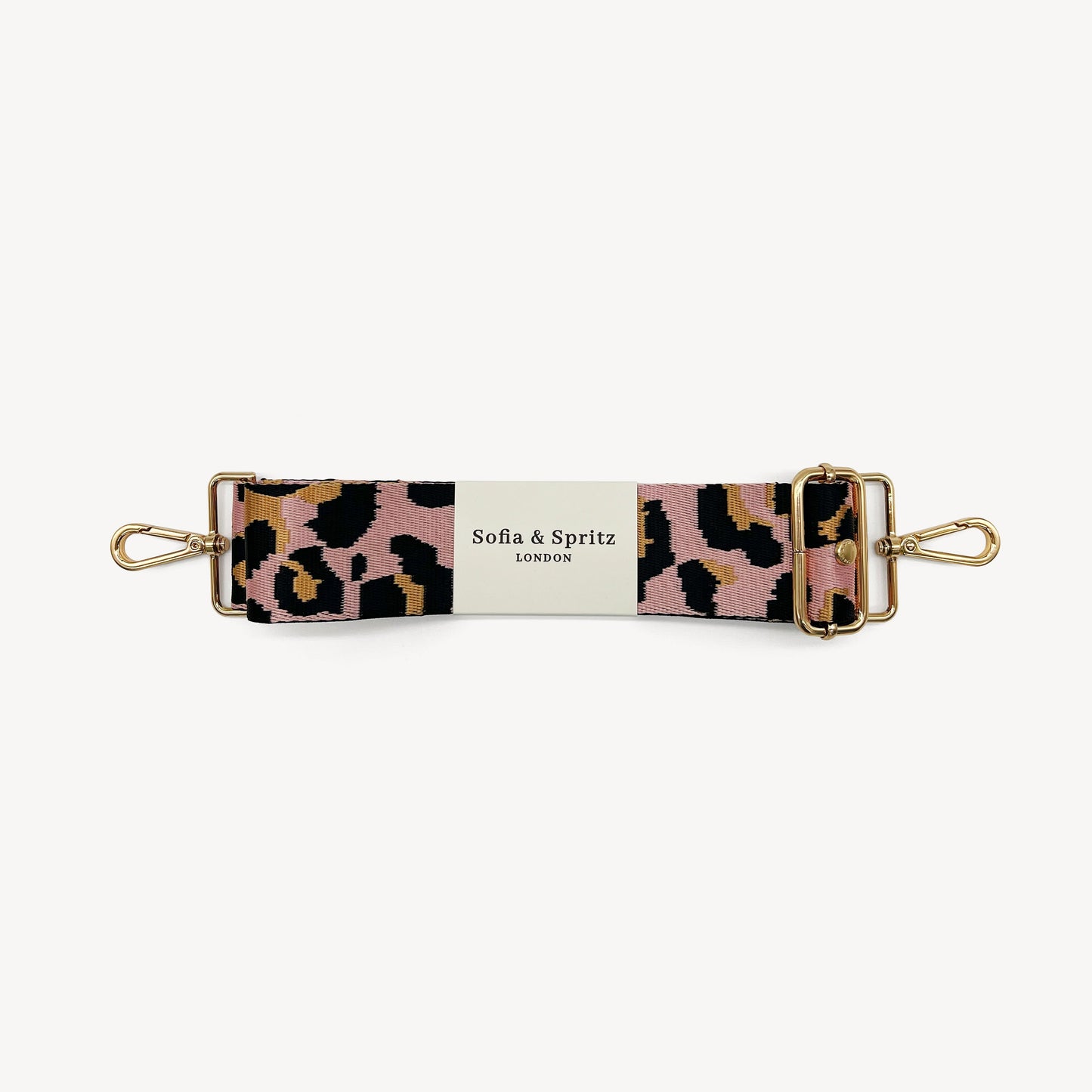 Correa elegante rosa pálido y dorado con estampado de leopardo