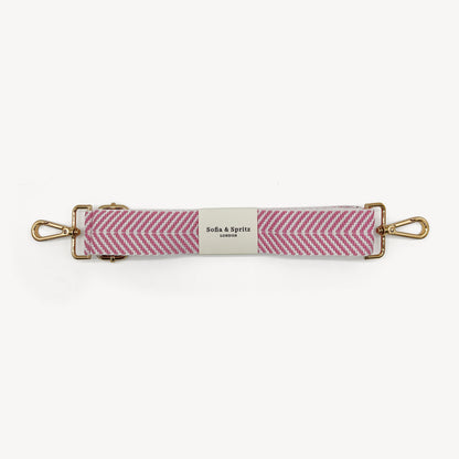 Correa elegante en rosa pálido y blanco con patrón chevron